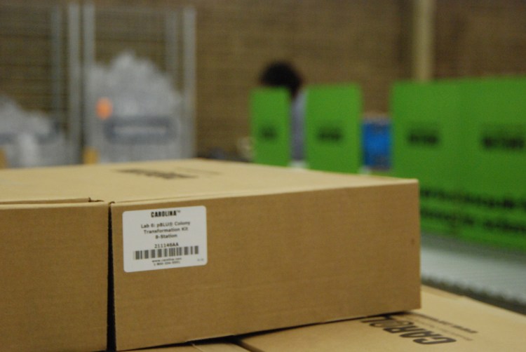 A staff member works on putting together a new kit the company is marketing. They currently offer more than 700 different science kits. 