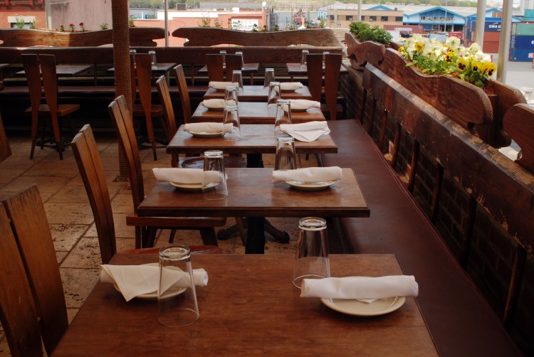 The roof is covered, so whether sun or rain Alma is open for business. 